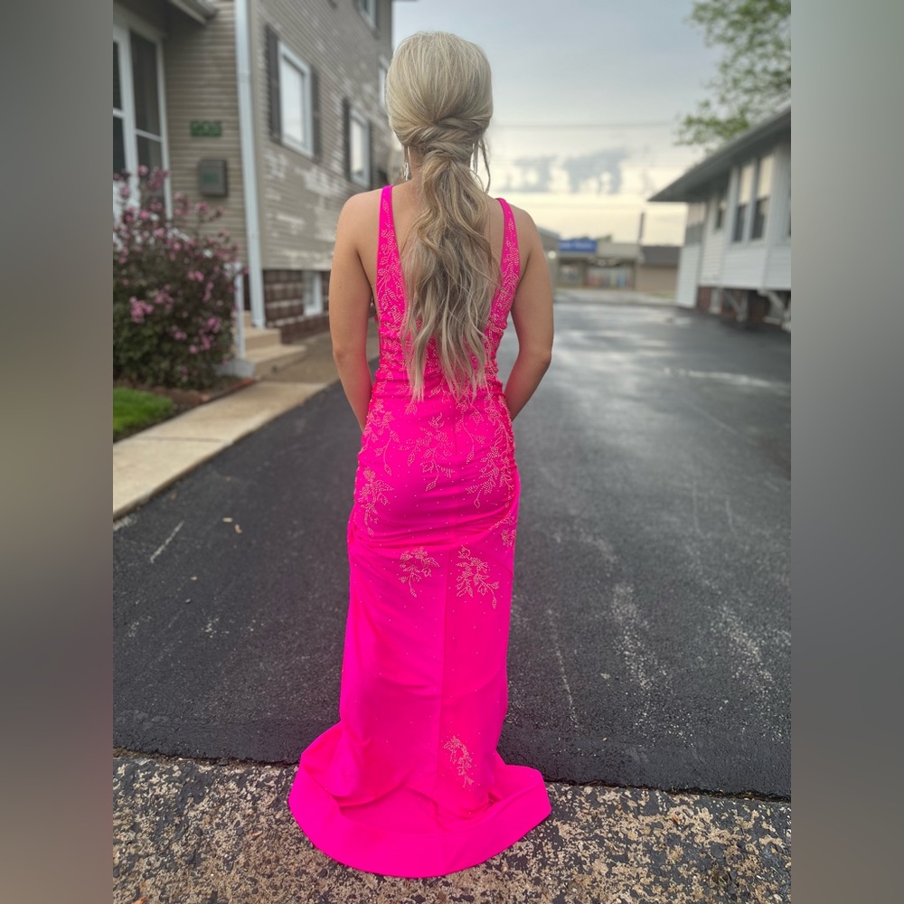 Gorgeous hot pink formal gown. Worn once and currently at the cleaners (1/23)
